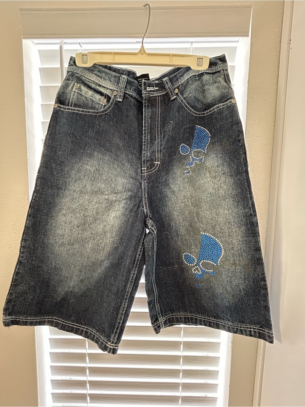 Men’s Sacred Cult Baggy Denim Shorts with Blue Skull Stud Accents